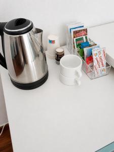 a coffee maker sitting on top of a counter at Villino Isò in La Spezia