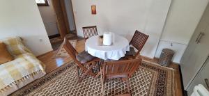 an overhead view of a table and chairs in a living room at Apartmani Jelenača prizemlje in Trnovo