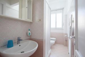 a bathroom with a sink and a toilet at Appartamento Vela Verde in Sestri Levante