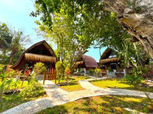 a house with a path leading to it at Gila House - Adults only in Gili Islands