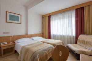 Postel nebo postele na pokoji v ubytování Garni Bellavista