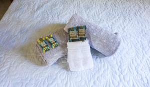 an overhead view of two pillows on a bed at Casa Flor in Ilha de Boipeba