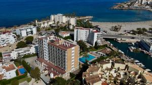 an aerial view of a resort and the ocean at Hotel Villa Naranjos in Jávea