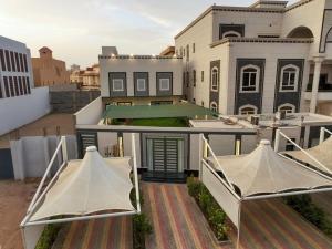 an aerial view of a house with two roofs at فيلا ابو بندر in Jeddah