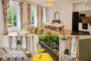a living room with a couch and a table at Les Meublés d'Etigny in Luchon