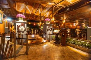 a room with a table and some plants at Baldi Hot Springs Hotel & Spa in Fortuna