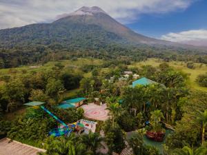 an aerial view of a resort with a mountain in the background at Baldi Hot Springs Hotel & Spa in Fortuna