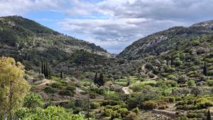a view of a valley in the mountains at Saint George Terrace House in Chios