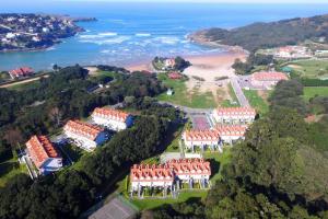 an aerial view of a campus near the ocean at Duplex con vistas La Arena 4605 in Arnuero