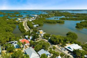 an aerial view of a town on the river at Fisher Flats Downstairs in Cedar Key