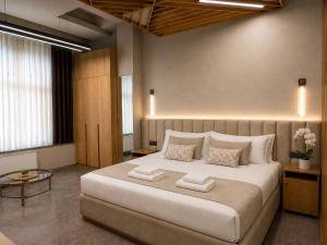 a bedroom with a large bed in a room at Yerevan Resident Hotel in Yerevan
