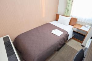Postel nebo postele na pokoji v ubytování Hotel Select Inn Utsunomiya