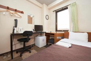 Postel nebo postele na pokoji v ubytování Hotel Select Inn Utsunomiya