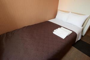 Postel nebo postele na pokoji v ubytování Hotel Select Inn Utsunomiya