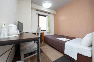 Postel nebo postele na pokoji v ubytování Hotel Select Inn Utsunomiya