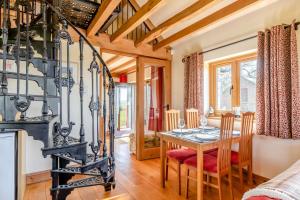 a dining room with a table and chairs at 2 Bed in Dorchester oc-dc075 in Charminster +14 photos