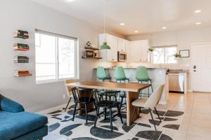 a kitchen and dining room with a table and chairs at The Pine House in Flagstaff +36 photos