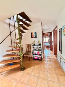 a hallway with a staircase in a house at Villa Terrazos in Terrazos