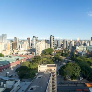 a city view of a city with tall buildings at Metropolitan Flats in Curitiba