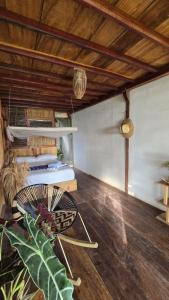 a room with a bed and a fan on the floor at El cielo hotel isla fuerte in Puerto Limón +12 photos