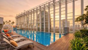 a swimming pool on the roof of a building at Suasana JB Central by TPL in Johor Bahru
