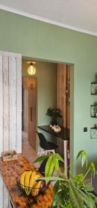a bunch of bananas in a bowl on a wooden table at Alora Cosy Suite in Kefalos +38 photos