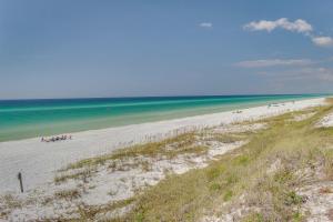 an overhead view of a beach with people on it at TOPS'L Summit 809 2 Bedroom in Destin