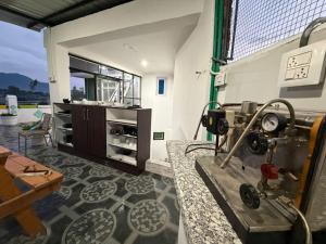 a sewing machine sitting on a counter in a room at FarahBakshResidency in Jāmb