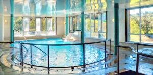 Bazén v ubytování Hotel Balneario Río Pambre nebo v jeho okolí