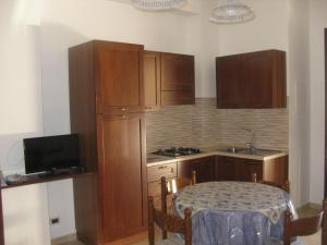 A kitchen or kitchenette at La Casa del Teatro