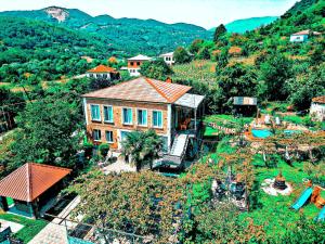 an aerial view of a house on a hill at Iveri House in Kutaisi