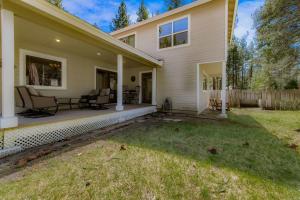 a house with a porch with chairs and a yard at Royal Retreat Quiet & Cozy in South Lake Tahoe +39 photos