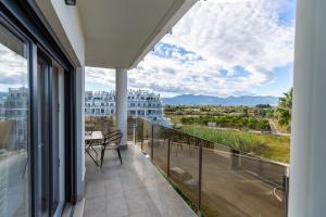 a balcony with a view of a building at Nicolas in Casas Devesa