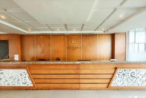 a lobby with a reception desk in a building at Tây Nam 2 Hotel in Can Tho