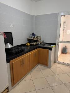 a kitchen with a sink and a counter top at RiF Services in Al Hoceïma