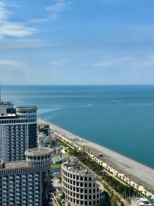 an aerial view of a city and the ocean at Batumi Best View in Batumi