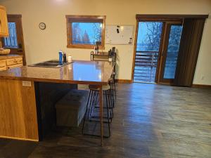a kitchen with a sink and a counter top at River View Upstairs Apartment in Kenai