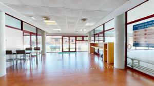 a large room with tables and chairs and windows at Jazmin ID300 in Villanueva de Río Segura +17 photos