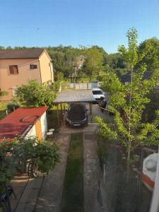 an aerial view of a car parked in a parking lot at Apartments Sandra in Novigrad Istria