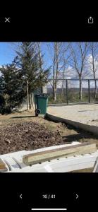 a picture of a park with a trash can at Camping Ohel in Mullini i Danit