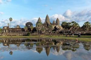 a view of a temple with a reflection in a pond at Sakun House in Siem Reap
