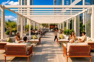 a rendering of the rooftop patio of a building at Millennium Central Downtown - Dubai in Dubai