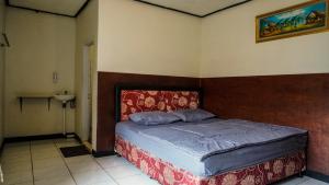a bedroom with a bed in a room at BROMO B&B in Bromo