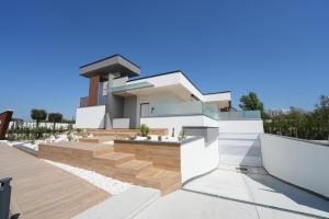 a rendering of a house with a garden at Maison d'Elite in Marigliano