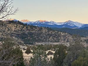 a view of a mountain with snow covered mountains at Charming, Spacious, Contemporary Mountain Retreat in Whitehall
