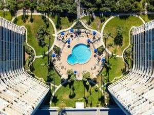 an aerial view of a park with a swimming pool at Waterfront Condo Beach Access & Pool Luxury in Marco Island