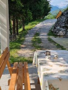 a table sitting on the side of a road at Room AIKA in Tolmin