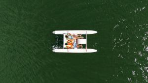 a person on a boat in the water at EvaZion in Grande Rivière Sud Est