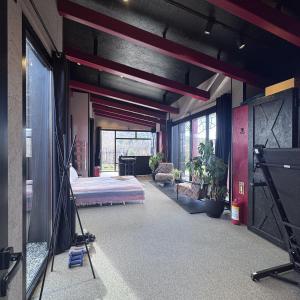 a room with a bedroom with a bed and a tv at Baraka Suite in İznik