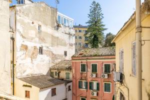 a group of buildings next to each other at The Loft by Life Homes in Corfu +9 photos